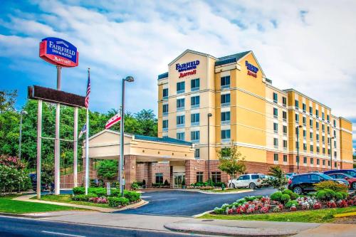 a hotel with a sign in front of a building at Fairfield Inn & Suites-Washington DC in Washington, D.C.