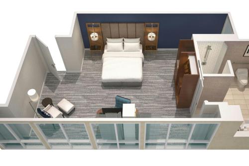 a floor plan of a bedroom with a bed at Boston Marriott Long Wharf in Boston