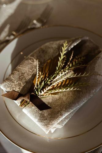 a silver napkin with a plant on a plate at Boston Marriott Long Wharf in Boston