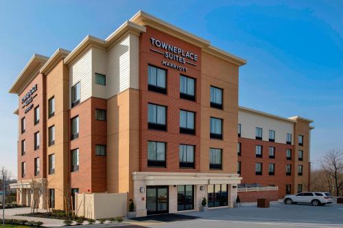 a building with a sign on the front of it at TownePlace Suites by Marriott College Park in College Park