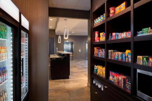 a grocery store aisle with food on shelves at TownePlace Suites by Marriott Toronto Northeast/Markham in Markham
