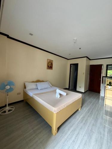 Llit o llits en una habitació de J&K Sunrise