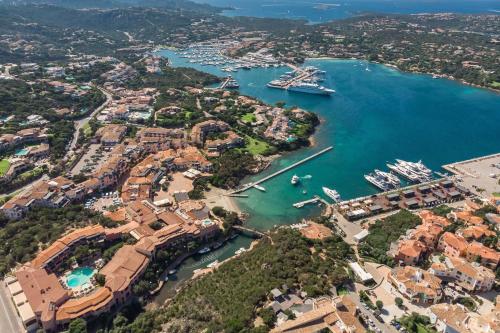 an aerial view of a harbor with a cruise ship at Cervo Hotel,Costa Smeralda Resort in Porto Cervo