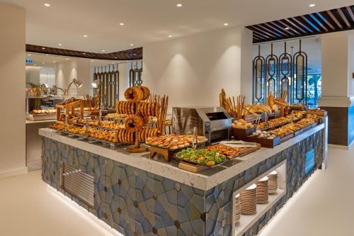 a display of fruits and vegetables on a counter at Liberty Signa in Fethiye