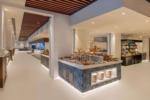 a kitchen with a counter with food on it at Liberty Signa in Fethiye