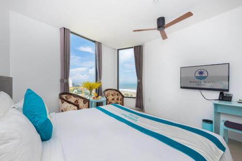 Postel nebo postele na pokoji v ubytování Annata Beach Hotel
