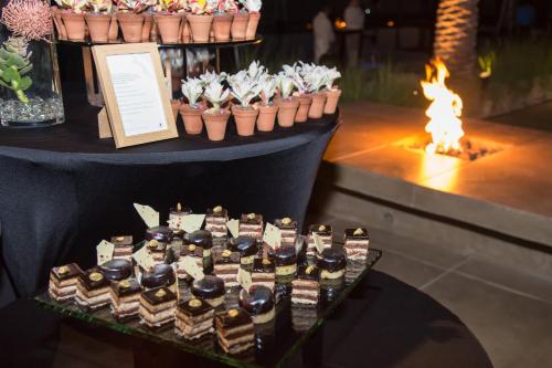 a display of chocolate desserts inront of a fire at JW Marriott Los Cabos Beach Resort & Spa in San José del Cabo