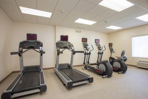 a gym with several tread machines in a room at SpringHill Suites Orlando Altamonte Springs/Maitland in Orlando