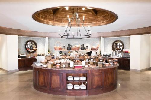 a large room with a counter in a store at JW Marriott Guanacaste Resort & Spa in Tamarindo