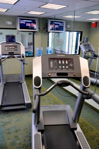 a gym with two treadmills and a treadmill at SpringHill Suites Galveston Island in Galveston