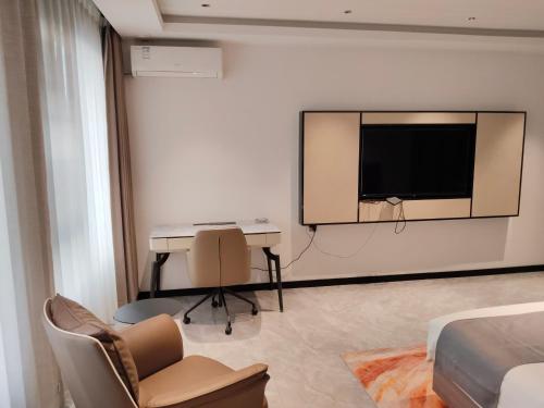 TV a/nebo společenská místnost v ubytování Hotel EDEN