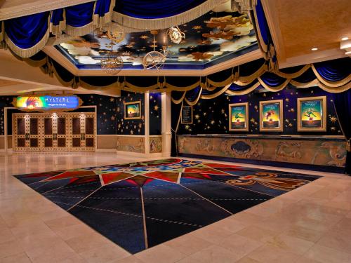
a large room with a large clock on the ceiling at TI - Treasure Island Hotel & Casino in Las Vegas
