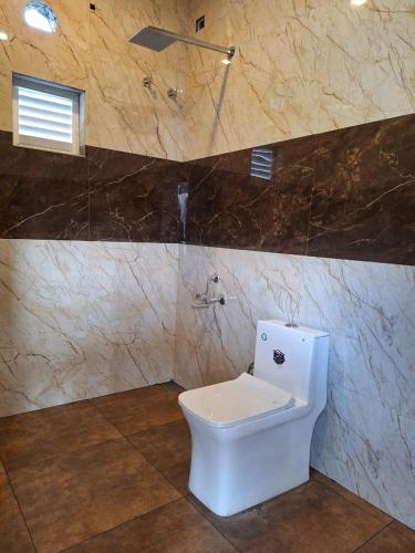 Ένα μπάνιο στο Vagamon Hill Casa Holiday Home