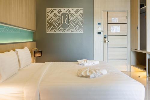 Katil atau katil-katil dalam bilik di River Hotel Hatyai
