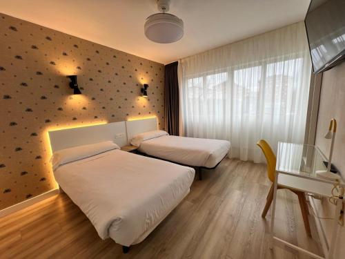 Una cama o camas en una habitación de IRAIPE Gorbea Auto Check-in