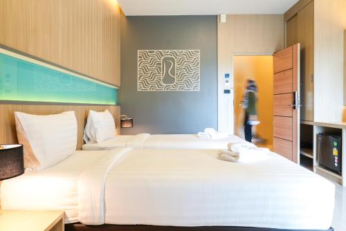 Katil atau katil-katil dalam bilik di River Hotel Hatyai