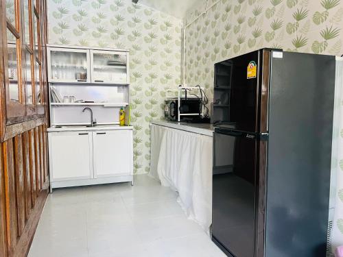 Kuchyň nebo kuchyňský kout v ubytování Tharathip Resort Koh Phangan - SHA Plus