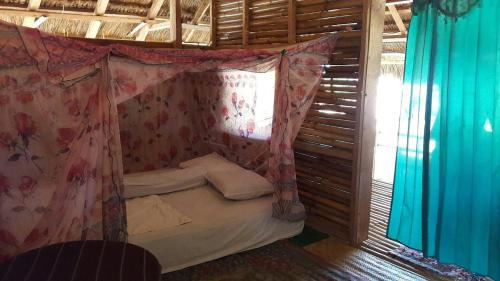 Postel nebo postele na pokoji v ubytování Musa Home Stay