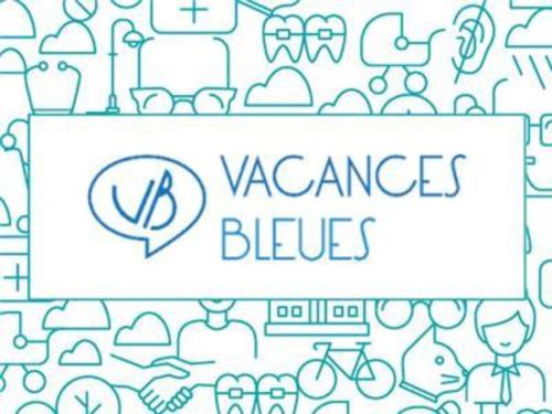 a group of people holding a sign that says vaselines blues at La Villa Du Lac- 3 rooms for 6 people in Divonne-les-Bains