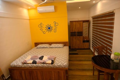 Postel nebo postele na pokoji v ubytování Sidharth Resort, Vadavannur