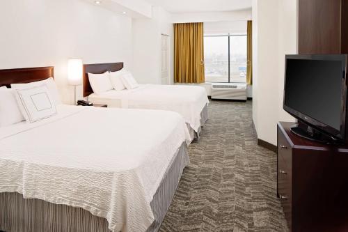 Postel nebo postele na pokoji v ubytování SpringHill Suites by Marriott Ardmore