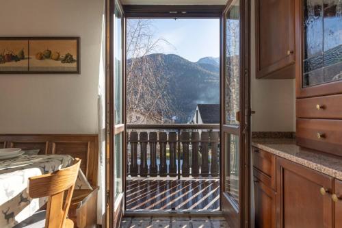a balcony with a view of a mountain at Dimora Svaizer, Terzolas Ospitar in Terzolas