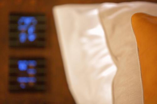 a close up of a white shirt next to a microwave at Costa Rica Bibione SPA in Bibione