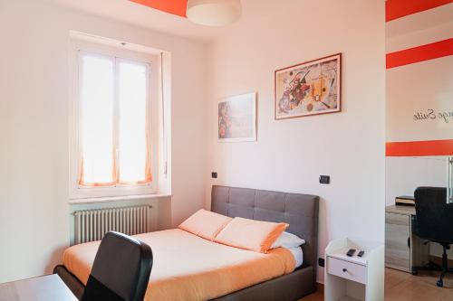 Una cama o camas en una habitación de Equipped Apt Near to Parco Dora