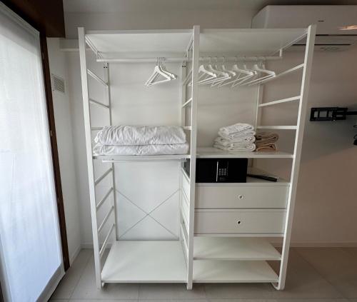 Μία ή περισσότερες κουκέτες σε δωμάτιο στο Residence Bristol Bibione