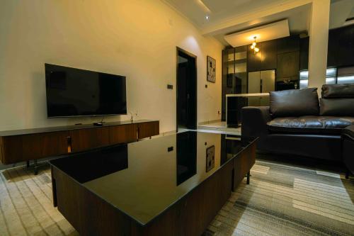 Televisyen dan/atau pusat hiburan di Jabo Suites