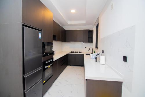 Dapur atau dapur kecil di Jabo Suites