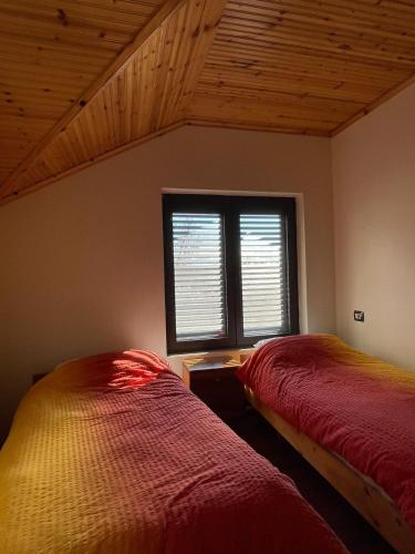 Postel nebo postele na pokoji v ubytování Stone Villa Ballabanec Kruje