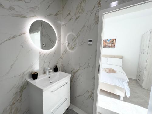 Ένα ή περισσότερα κρεβάτια σε δωμάτιο στο Apartments Tereza
