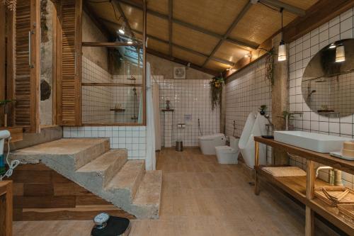 Un baño de Woo Ma Ca Moo