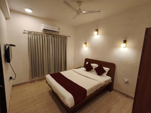 Cama o camas de una habitación en Hotel Sandesh Palace Lonavala