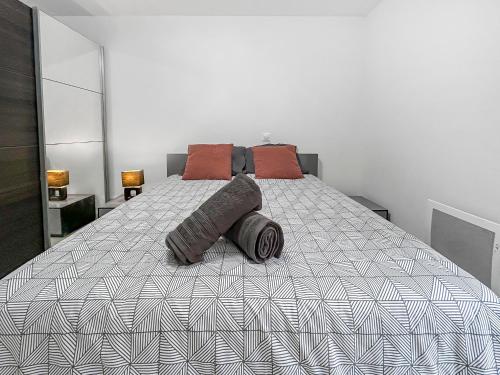 Ένα ή περισσότερα κρεβάτια σε δωμάτιο στο Appartement cosy tout équipé - Séjour idéal à Nice