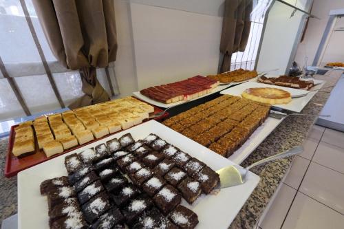 a buffet with many different types of food on display at Kandelor Hotel in Alanya