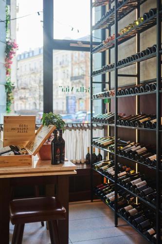 a wine rack filled with lots of wine bottles at Sheraton Grand Warsaw in Warsaw