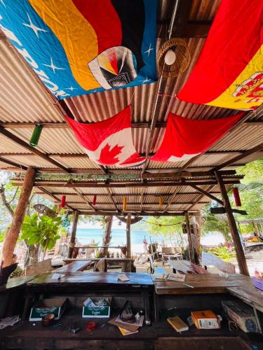 a room with a ceiling with a painting on it at Koh Phu Valley in Ko Jum