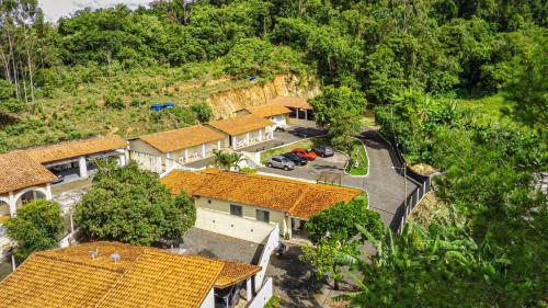 an overhead view of a house with orange roofs at Pousada Saint James in Águas de Lindóia