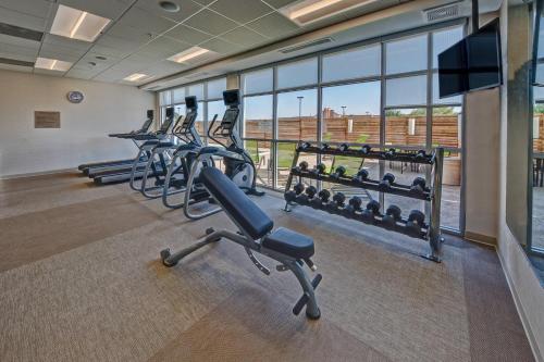 a row of exercise bikes in a gym at SpringHill Suites by Marriott Amarillo in Amarillo