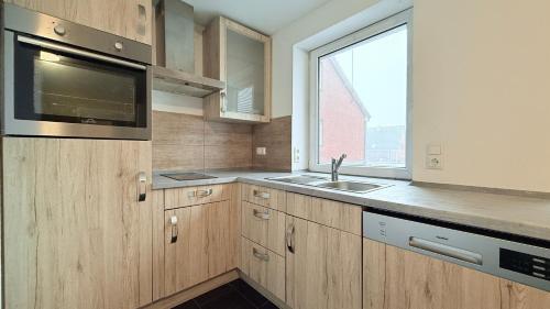 Η κουζίνα ή μικρή κουζίνα στο ProStay Apartments - nahe Itzehoe