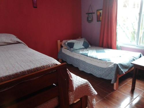 En eller flere senge i et værelse på Chalet sueños del mar