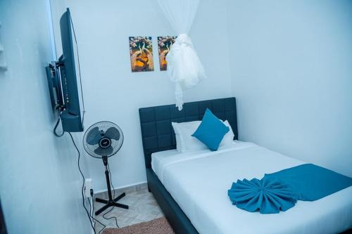 Ένα ή περισσότερα κρεβάτια σε δωμάτιο στο The lit garden place