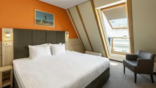 Postel nebo postele na pokoji v ubytování Wellton Riga Hotel & SPA