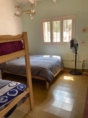 Ένα ή περισσότερα κρεβάτια σε δωμάτιο στο Emilia Posada de Montaña