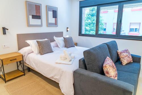 Khu vực ghế ngồi tại Oviedo Centro Apartamentos Pedregal