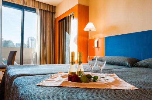 Postel nebo postele na pokoji v ubytování Hotel Villacarlos