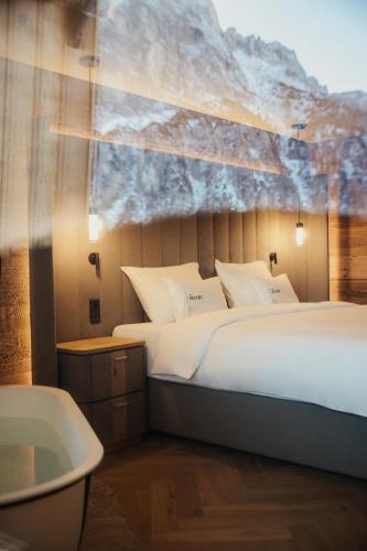 Postel nebo postele na pokoji v ubytování Hotel Recort