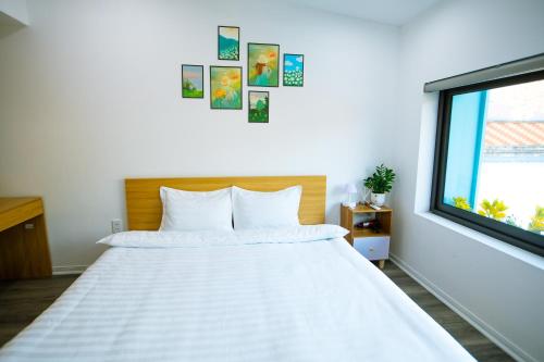 Postel nebo postele na pokoji v ubytování Mơ House Mộc Châu